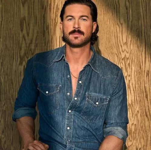 Riley Green with acoustic guitar